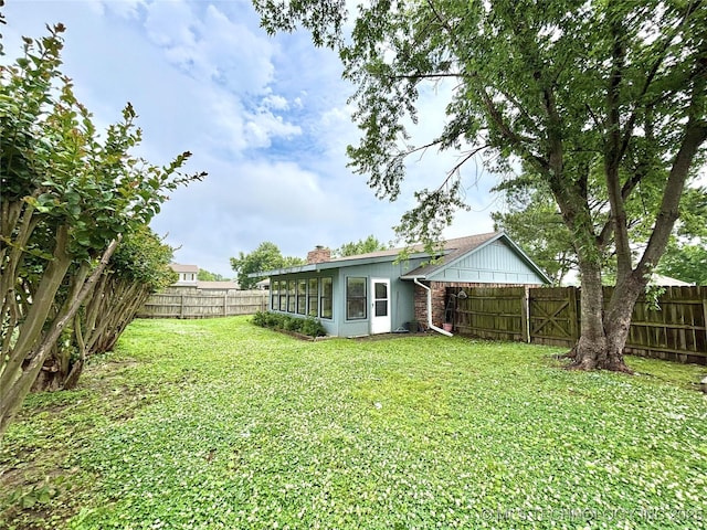 1903 Swan Ln, Mcalester, OK 74501 - view of yard featuring a sunroom