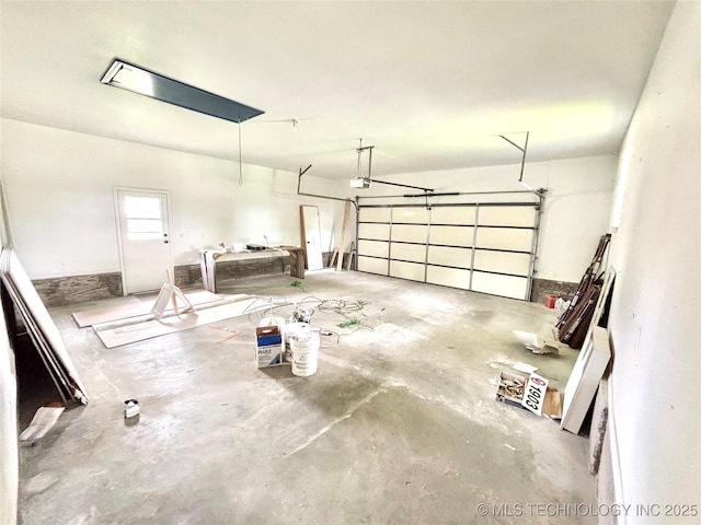 1903 Swan Ln, Mcalester, OK 74501 - garage featuring a garage door opener