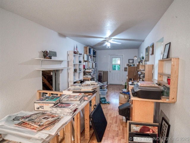 5404 Ranch Rd, Kingston, OK 73439 - office space featuring wood finished floors, ceiling fan, and a textured wall