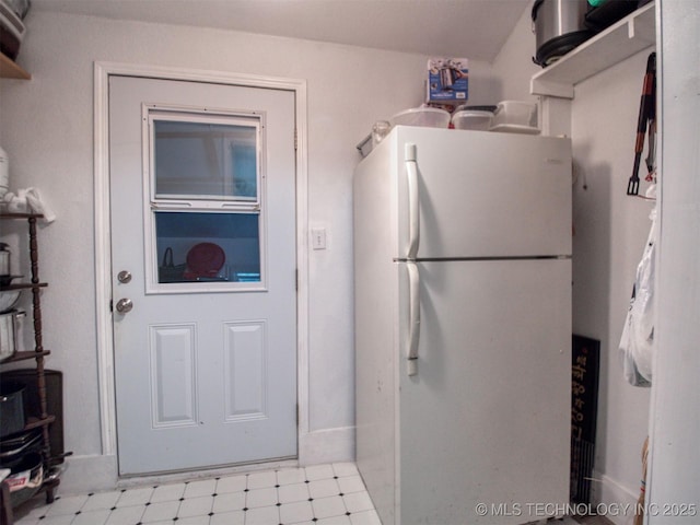 5404 Ranch Rd, Kingston, OK 73439 - kitchen with freestanding refrigerator and light floors