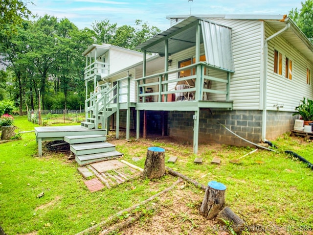 5404 Ranch Rd, Kingston, OK 73439 - back of property with a yard, a wooden deck, and stairs