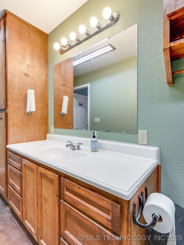1533 County Road 3480, Ada, OK 74820 - bathroom with a textured wall and vanity