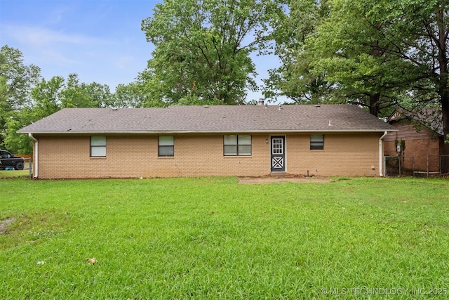 202 NE B St NE, Inola, OK 74036 - back of property with brick siding and roof with shingles