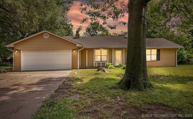 202 NE B St NE, Inola, OK 74036 - ranch-style home with an attached garage, brick siding, concrete driveway, a chimney, and a front lawn