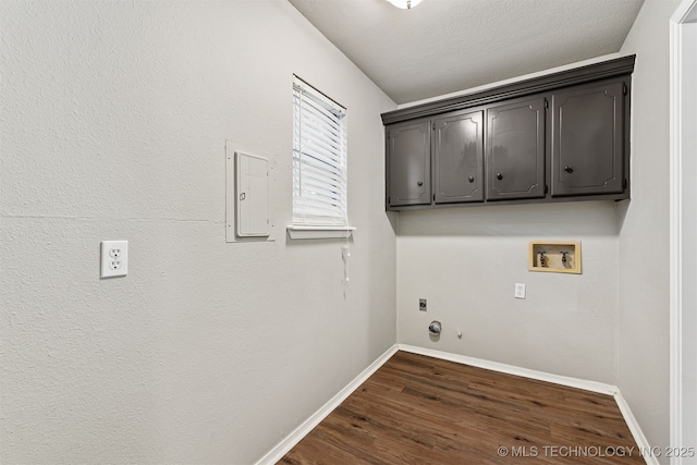 202 NE B St NE, Inola, OK 74036 - laundry area featuring washer hookup, hookup for an electric dryer, dark wood-type flooring, baseboards, and gas dryer hookup