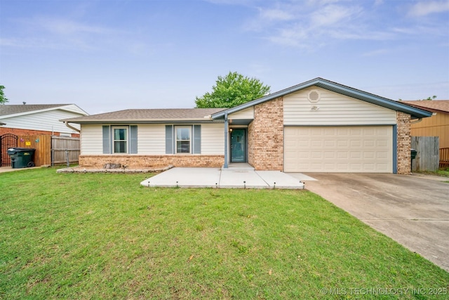 2910 S Main St, Sapulpa, OK 74066 - single story home with brick siding, a garage, and concrete driveway