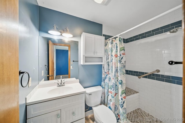 2910 S Main St, Sapulpa, OK 74066 - bathroom with a tile shower, vanity, and toilet
