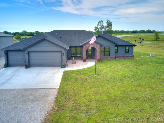 8859 N 50th W Ave, Sperry, OK 74073 - view of front of property featuring a garage, driveway, a front yard, and a chimney