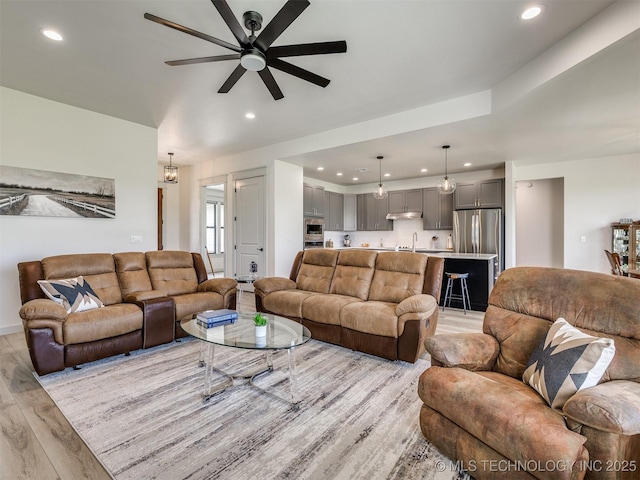 8859 N 50th W Ave, Sperry, OK 74073 - living room featuring recessed lighting, light wood-style flooring, and ceiling fan