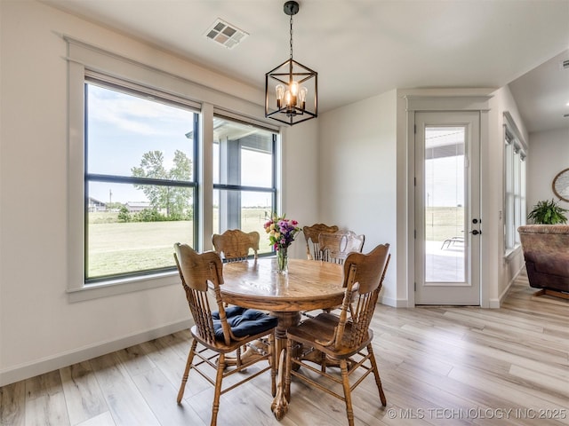 8859 N 50th W Ave, Sperry, OK 74073 - dining space featuring a chandelier, healthy amount of natural light, and baseboards