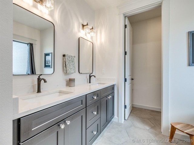 8859 N 50th W Ave, Sperry, OK 74073 - bathroom with double vanity, tile patterned flooring, and baseboards