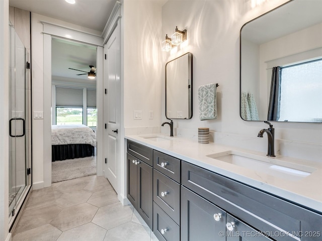 8859 N 50th W Ave, Sperry, OK 74073 - full bath with a ceiling fan, double vanity, a shower stall, connected bathroom, and tile patterned flooring