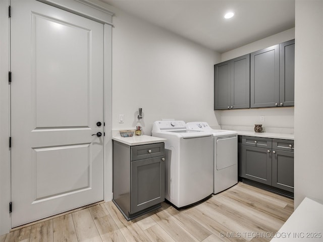 8859 N 50th W Ave, Sperry, OK 74073 - laundry area with cabinet space, washer and clothes dryer, light wood-style floors, and recessed lighting
