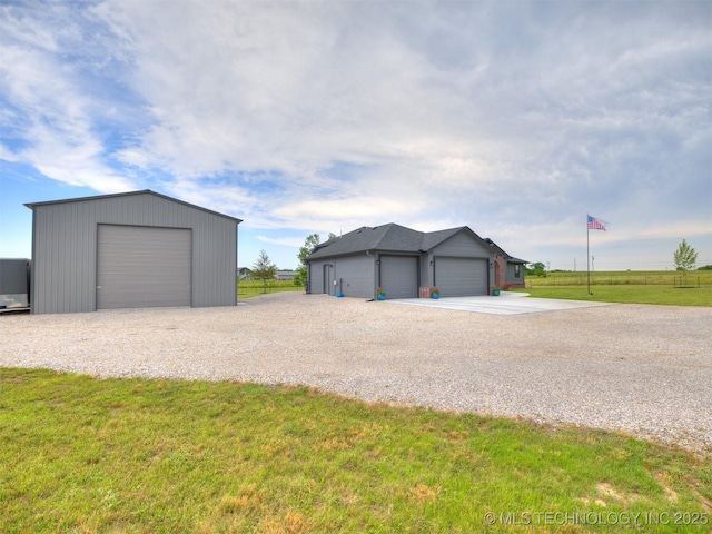 8859 N 50th W Ave, Sperry, OK 74073 - detached garage with gravel driveway