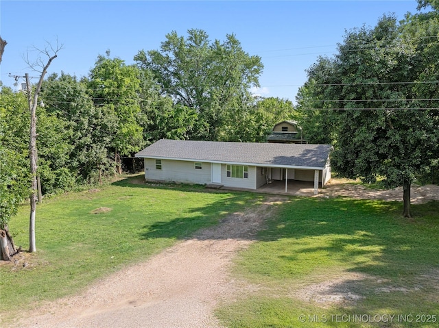 607 E Schley St, Vian, OK 74962 - view of front of home featuring driveway, a front lawn, and a carport