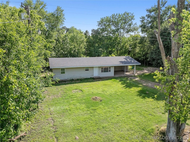 607 E Schley St, Vian, OK 74962 - view of front of house with a front yard and a carport