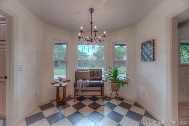 8221 S 74th E Ave, Tulsa, OK 74133 - sitting room featuring light floors, a chandelier, and baseboards