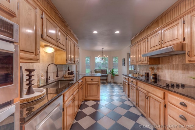 8221 S 74th E Ave, Tulsa, OK 74133 - kitchen with a sink, under cabinet range hood, light floors, recessed lighting, and a chandelier