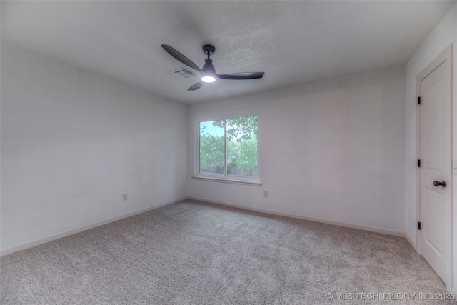 8221 S 74th E Ave, Tulsa, OK 74133 - empty room featuring a ceiling fan, carpet flooring, and baseboards