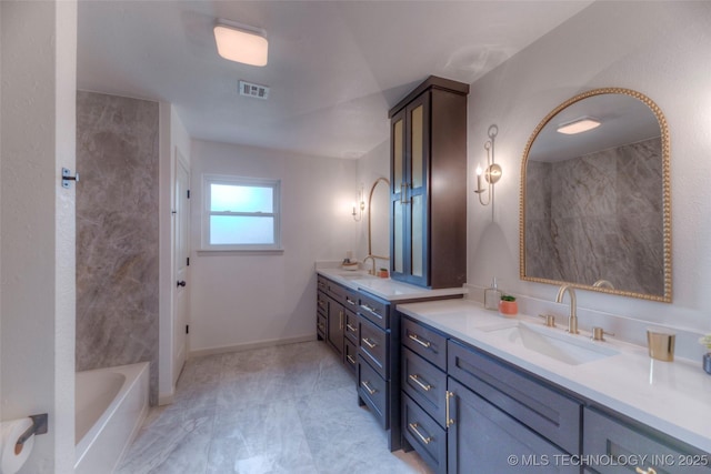 8221 S 74th E Ave, Tulsa, OK 74133 - bathroom with double vanity and a bathtub