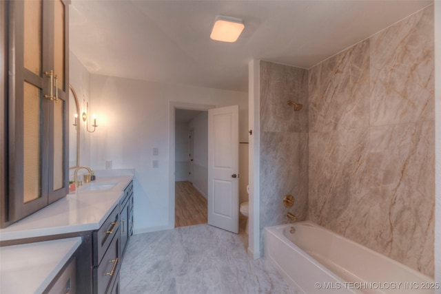 8221 S 74th E Ave, Tulsa, OK 74133 - bathroom featuring vanity, toilet, and shower / bathtub combination