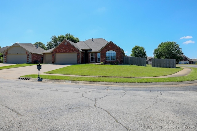 9701 N 98th E Ave, Owasso, OK 74055 - view of front facade featuring brick siding, an attached garage, and driveway