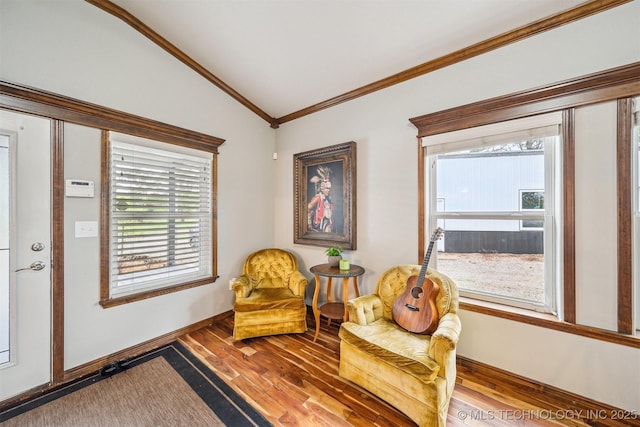 6529 S 159th Ave W, Sapulpa, OK 74066 - sitting room featuring lofted ceiling, crown molding, wood finished floors, healthy amount of natural light, and baseboards