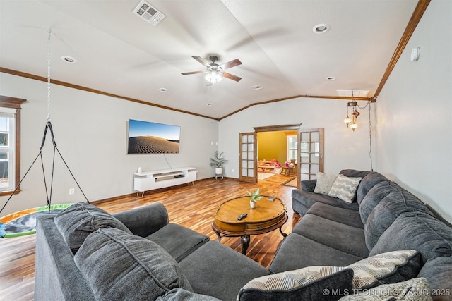 6529 S 159th Ave W, Sapulpa, OK 74066 - living area with ornamental molding, wood finished floors, lofted ceiling, ceiling fan, and baseboards