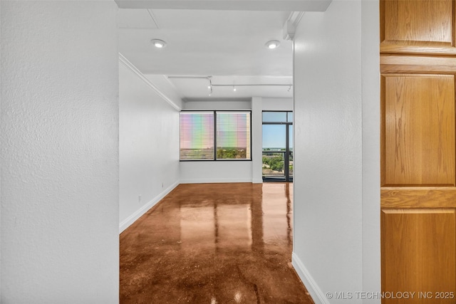 410 W 7th St Unit 1122, Tulsa, OK 74119 - corridor with finished concrete floors and baseboards