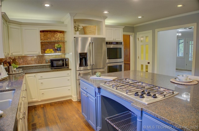 10520 S 69th E Ave, Tulsa, OK 74133 - kitchen featuring stainless steel appliances, open shelves, blue cabinetry, dark wood-style floors, and white cabinetry