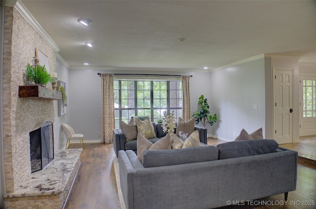 10520 S 69th E Ave, Tulsa, OK 74133 - living room featuring ornamental molding, baseboards, a fireplace, recessed lighting, and wood finished floors