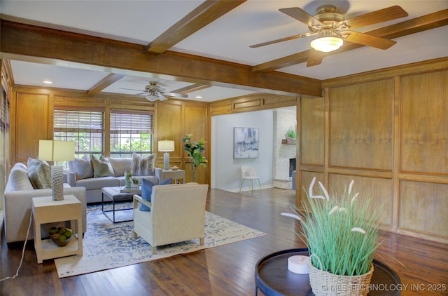 10520 S 69th E Ave, Tulsa, OK 74133 - living room with a ceiling fan, beam ceiling, wood finished floors, and a large fireplace