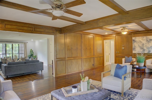 10520 S 69th E Ave, Tulsa, OK 74133 - living area with a ceiling fan, beam ceiling, dark wood finished floors, and wooden walls