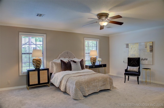 10520 S 69th E Ave, Tulsa, OK 74133 - bedroom with light colored carpet, multiple windows, ornamental molding, baseboards, and ceiling fan