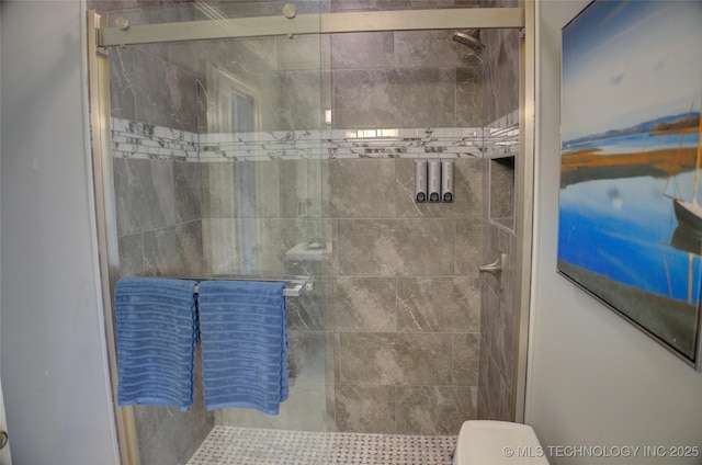 10520 S 69th E Ave, Tulsa, OK 74133 - full bathroom with a stall shower and toilet