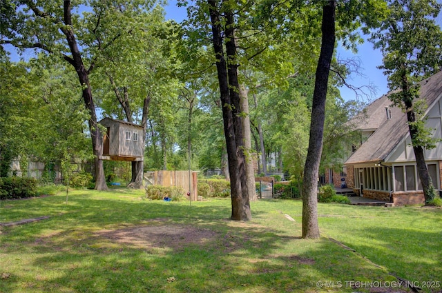 10520 S 69th E Ave, Tulsa, OK 74133 - view of yard with a sunroom
