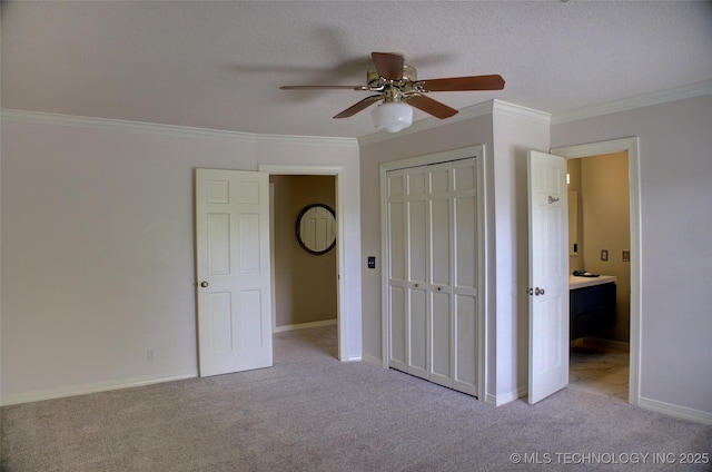 10520 S 69th E Ave, Tulsa, OK 74133 - unfurnished bedroom with light carpet, ornamental molding, a closet, a ceiling fan, and baseboards
