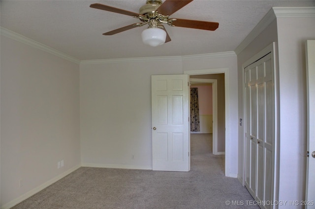 10520 S 69th E Ave, Tulsa, OK 74133 - unfurnished room featuring carpet floors, ornamental molding, a ceiling fan, and baseboards