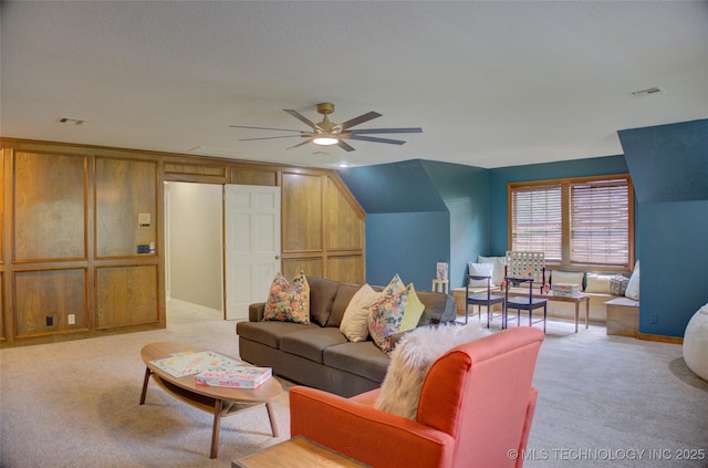 10520 S 69th E Ave, Tulsa, OK 74133 - living area with ceiling fan, light carpet, vaulted ceiling, and baseboards