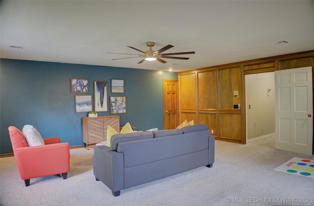 10520 S 69th E Ave, Tulsa, OK 74133 - living area with light colored carpet, ceiling fan, and baseboards