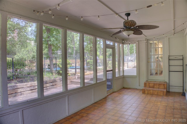 10520 S 69th E Ave, Tulsa, OK 74133 - unfurnished sunroom featuring plenty of natural light and tile patterned floors