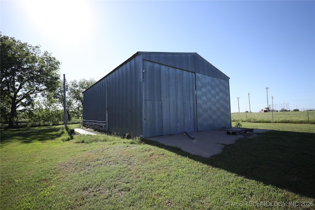 8845 Chestnut Rd, Henryetta, OK 74437 - view of pole building with a yard