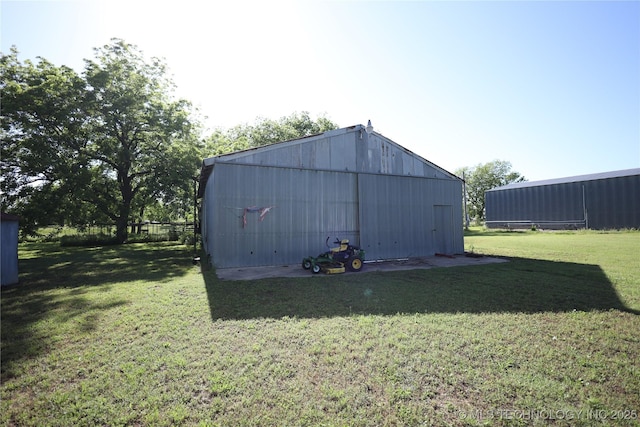 8845 Chestnut Rd, Henryetta, OK 74437 - view of pole building featuring a yard