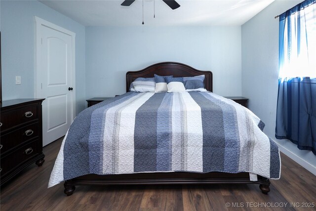 8845 Chestnut Rd, Henryetta, OK 74437 - bedroom featuring wood finished floors and a ceiling fan