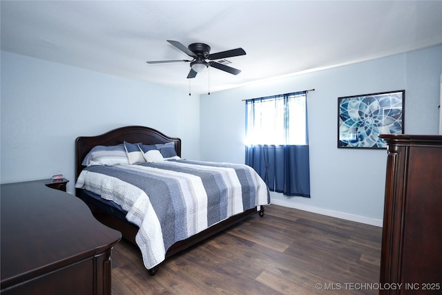 8845 Chestnut Rd, Henryetta, OK 74437 - bedroom with wood finished floors, ceiling fan, and baseboards