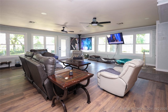 8845 Chestnut Rd, Henryetta, OK 74437 - living area with wood finished floors, a ceiling fan, and baseboards