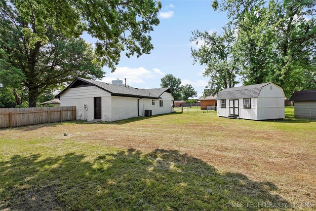 11607 E 24th St, Tulsa, OK 74129 - view of yard with central air condition unit