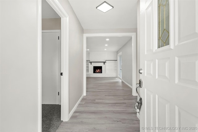 11607 E 24th St, Tulsa, OK 74129 - hallway featuring light wood-type flooring, baseboards, and recessed lighting