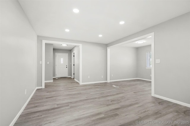 11607 E 24th St, Tulsa, OK 74129 - unfurnished room with baseboards, light wood-style flooring, and recessed lighting