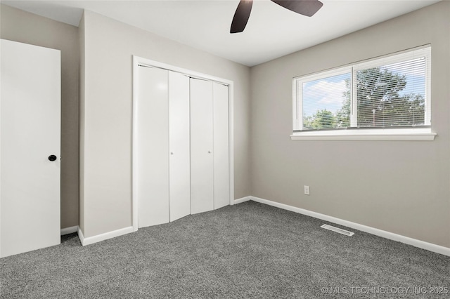 11607 E 24th St, Tulsa, OK 74129 - unfurnished bedroom with carpet floors, a closet, and baseboards